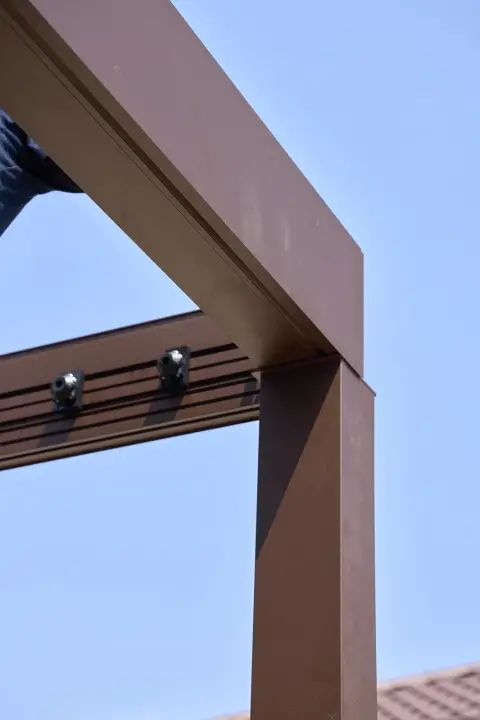 The completed pergola structure seen from below