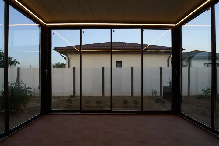 View of the garden through the sliding glass panels