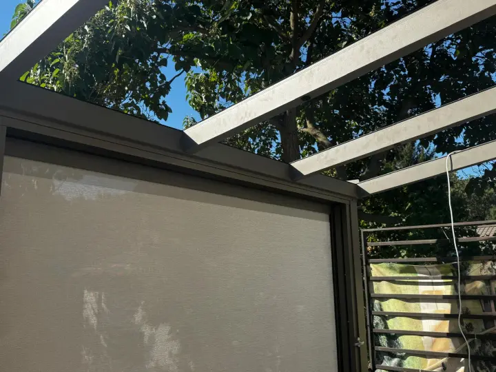 Detail of the zip screen fabric held in its side guide