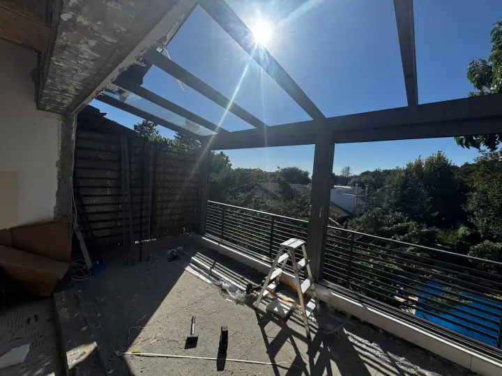 Aluminium structure and glass roof before the screens were fitted